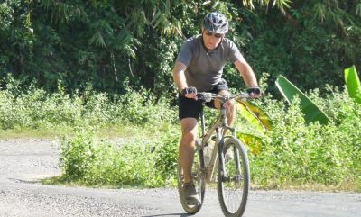 Alf Glover Cycling on the  tour with redspokes